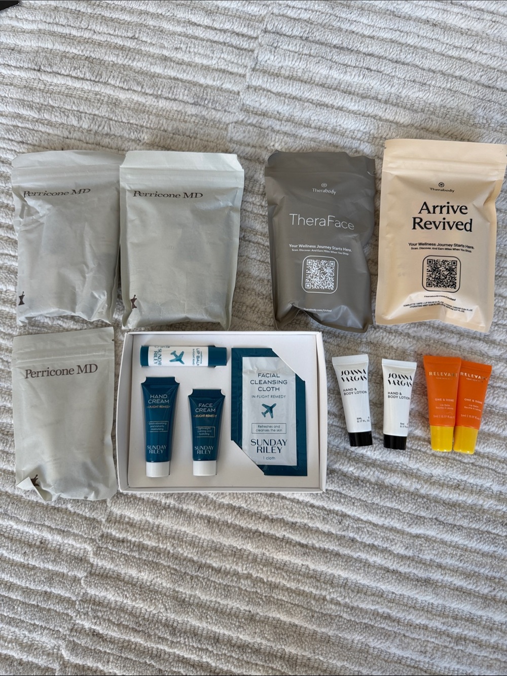 Perricone, Therabody, Sunday Riley Travel Skincare Set